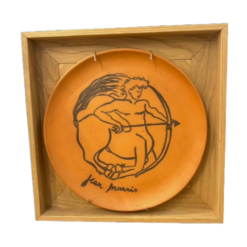 Cupid's orange plate by Jean Marais